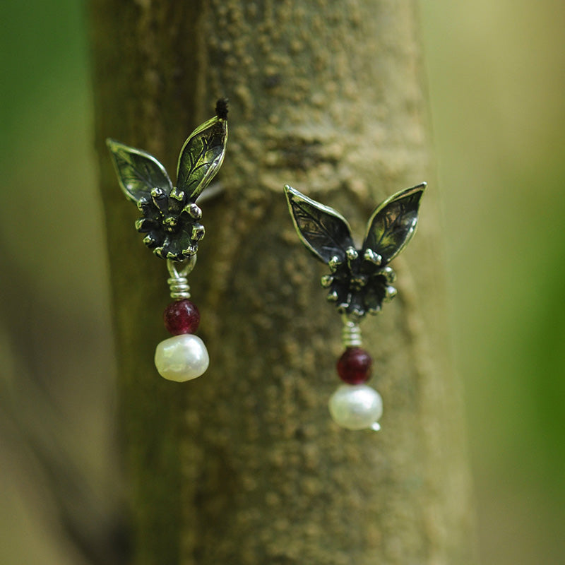 Aretes margarita con hojas